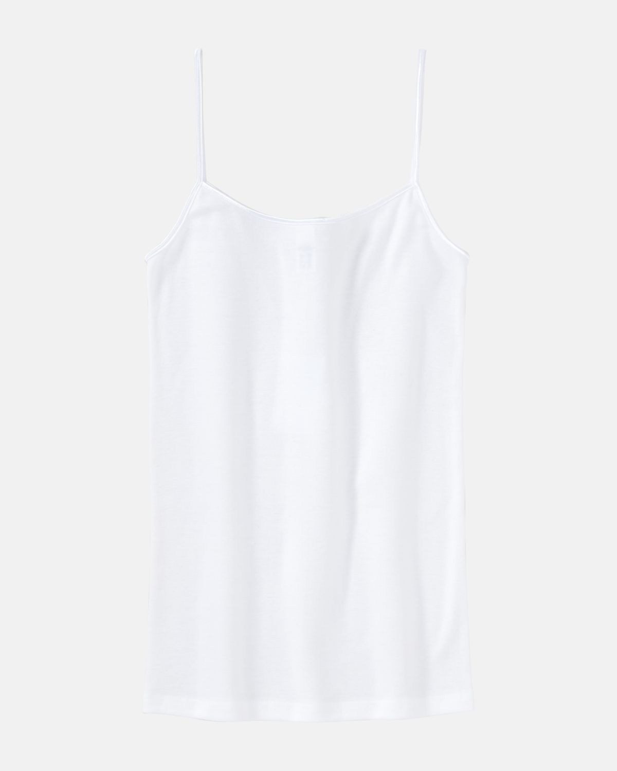 Hemd in weiß aus der Serie Natascha, flach auf einer Oberfläche liegend.