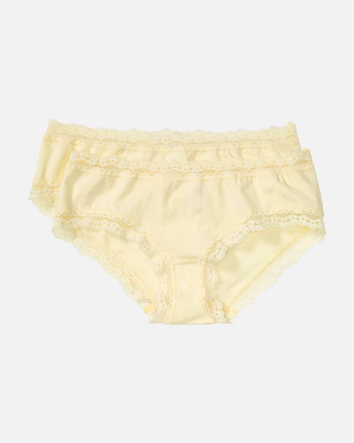 Low Hip in zitrone aus der Serie Lacy, flach auf einer Oberfläche liegend.