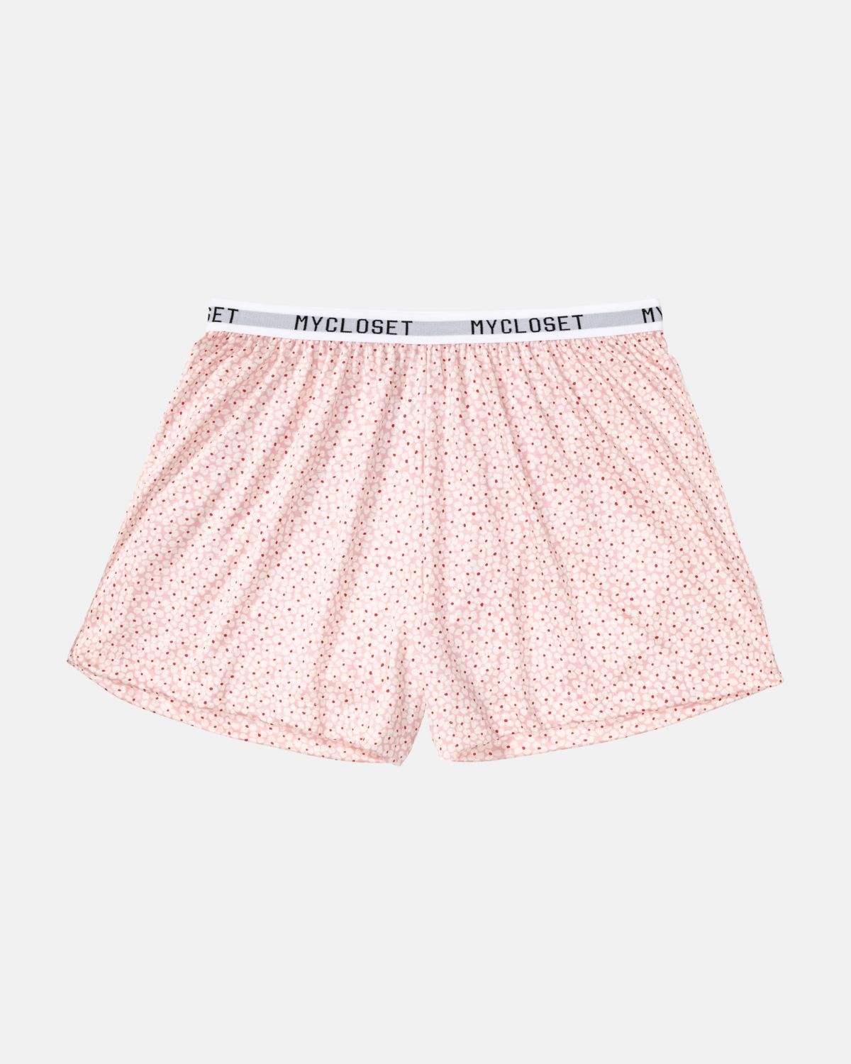 Shorts in floral aus der Serie Logo Lover, flach auf einer Oberfläche liegend.