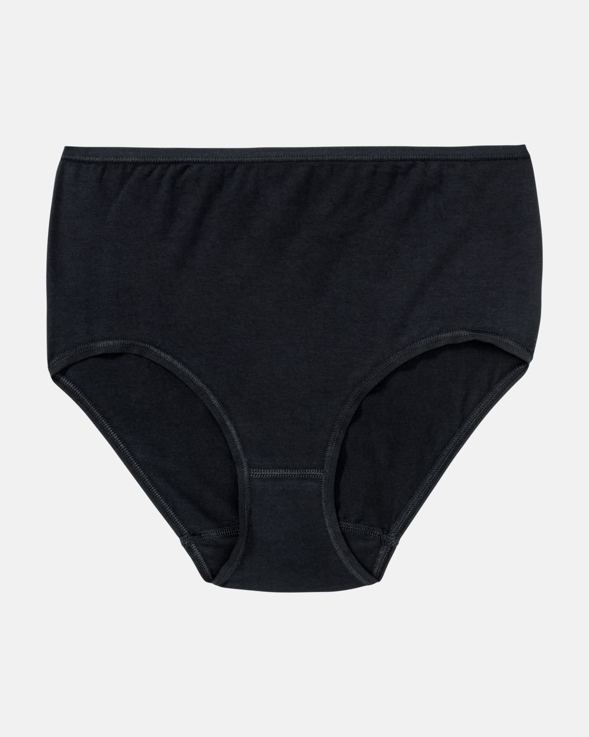 Maxislip in schwarz aus der Serie Natural Beauty, flach auf einer Oberfläche liegend.