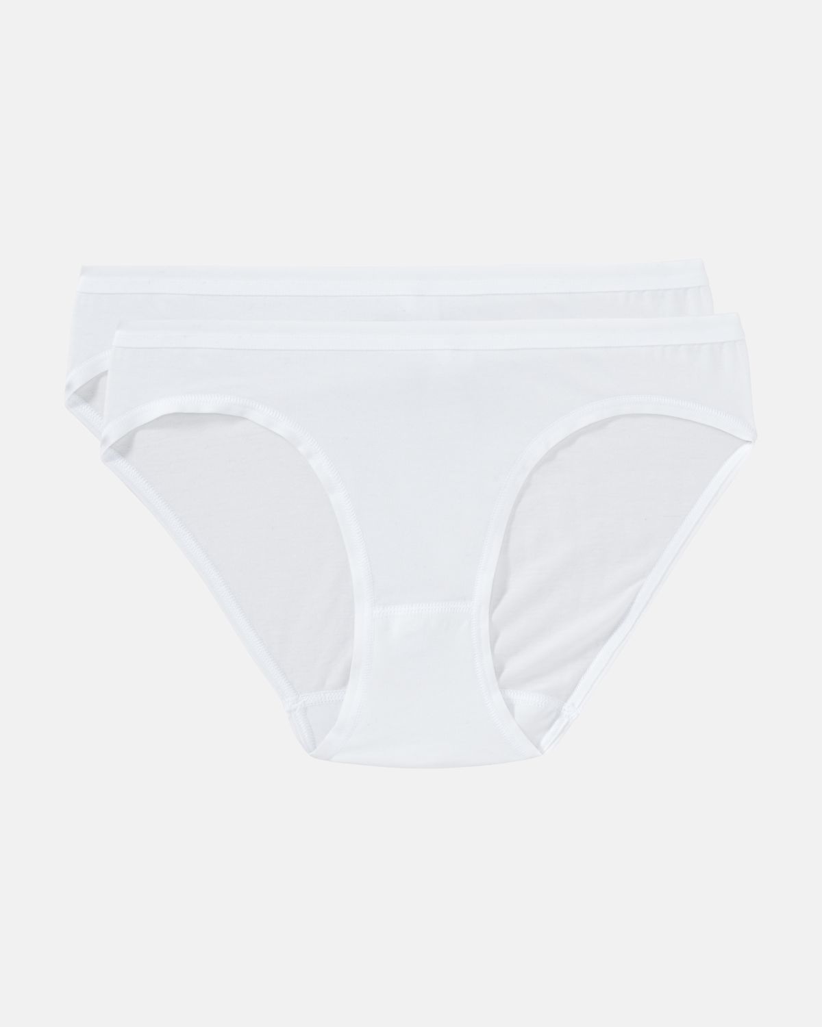 Minislip in weiß aus der Serie Take two, flach auf einer Oberfläche liegend.