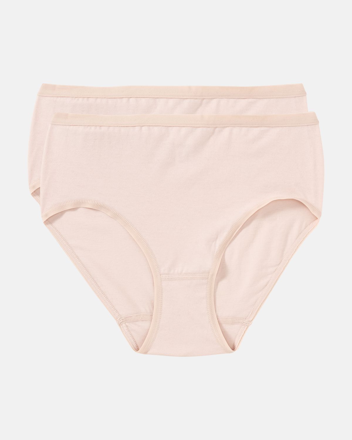 Midislip in honey aus der Serie Take two, flach auf einer Oberfläche liegend.