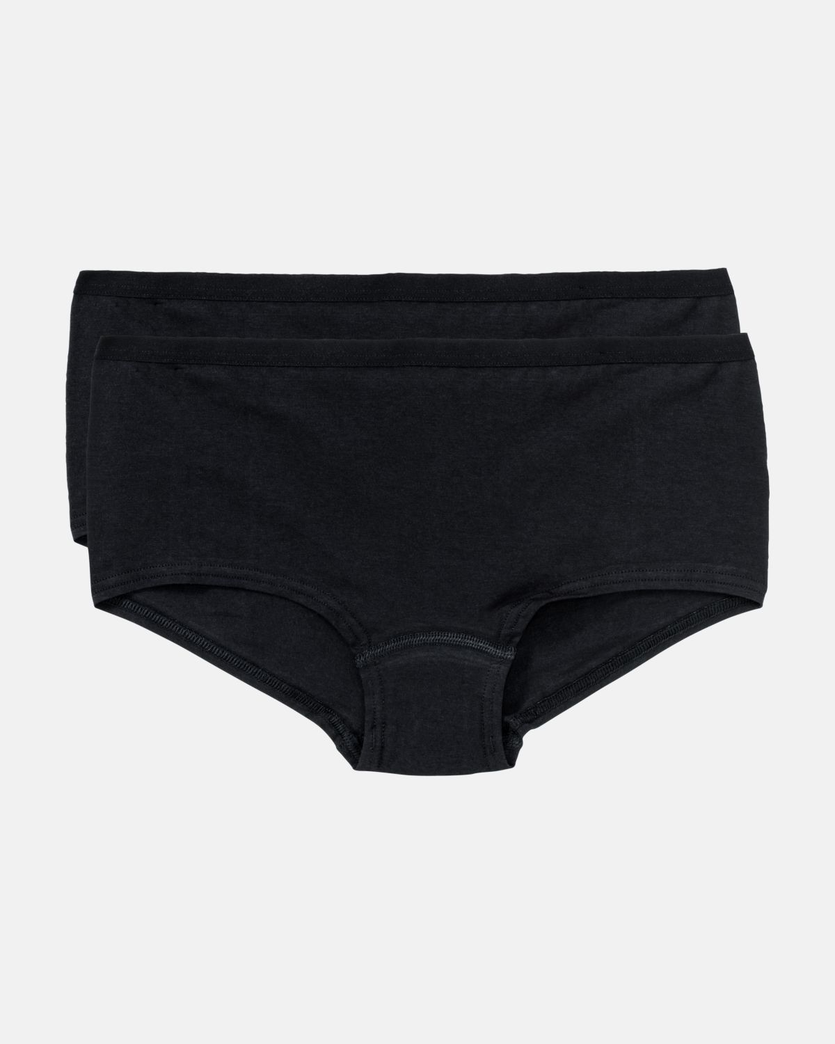 Pant in schwarz aus der Serie Take two, flach auf einer Oberfläche liegend.