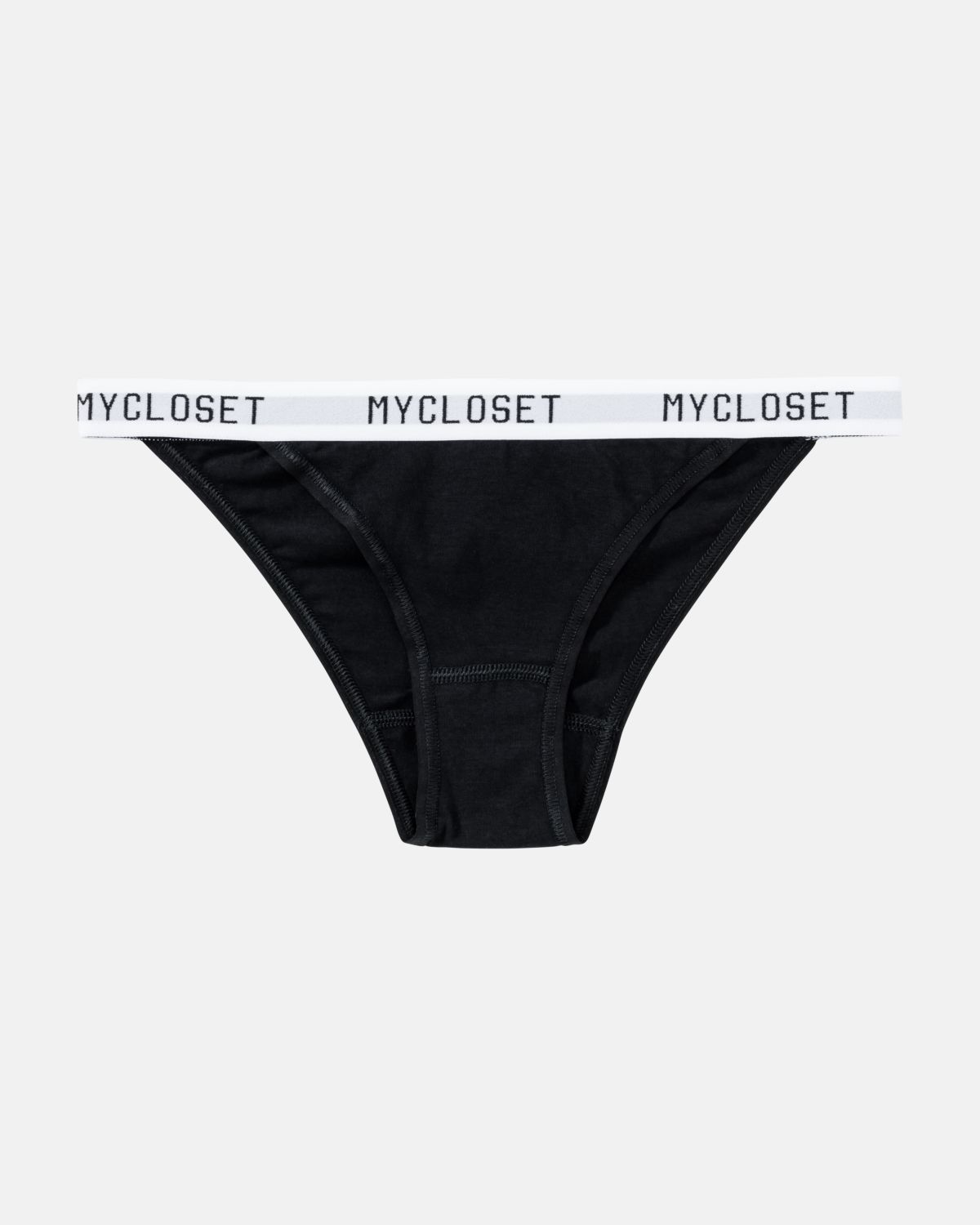 Tanga in schwarz aus der Serie Logo Lover, flach auf einer Oberfläche liegend.