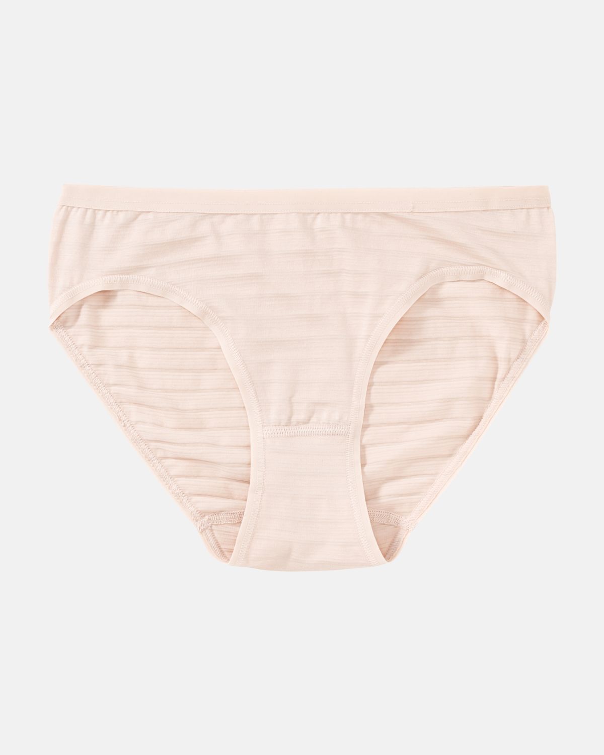 Bikinislip in honey aus der Serie Cotton&More, flach auf einer Oberfläche liegend.