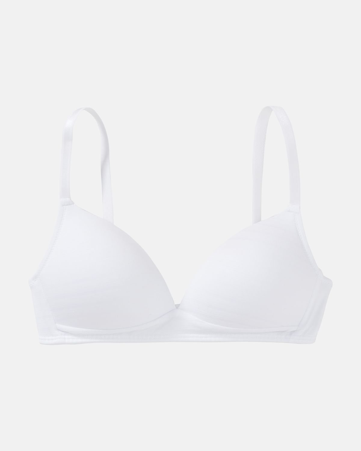 Schalen BH Triangle in weiß aus der Serie Cotton&More, flach auf einer Oberfläche liegend.