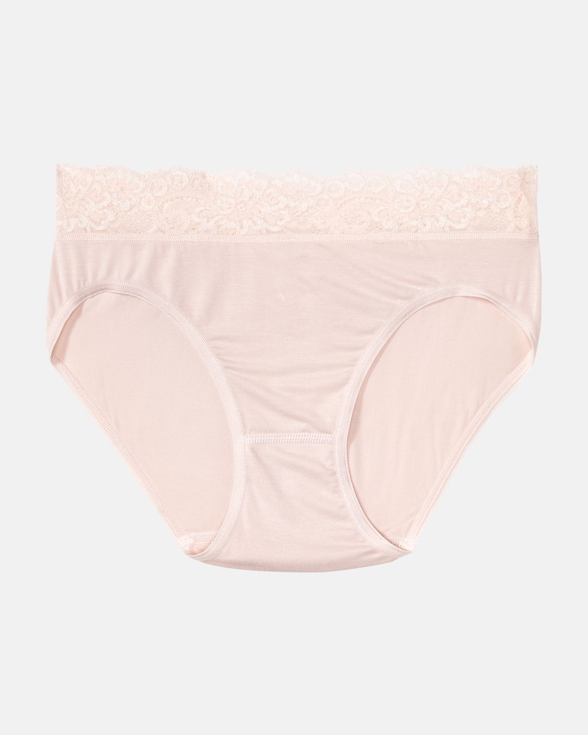 Bikinislip in lychee aus der Serie Sensuelle Lace, flach auf einer Oberfläche liegend.