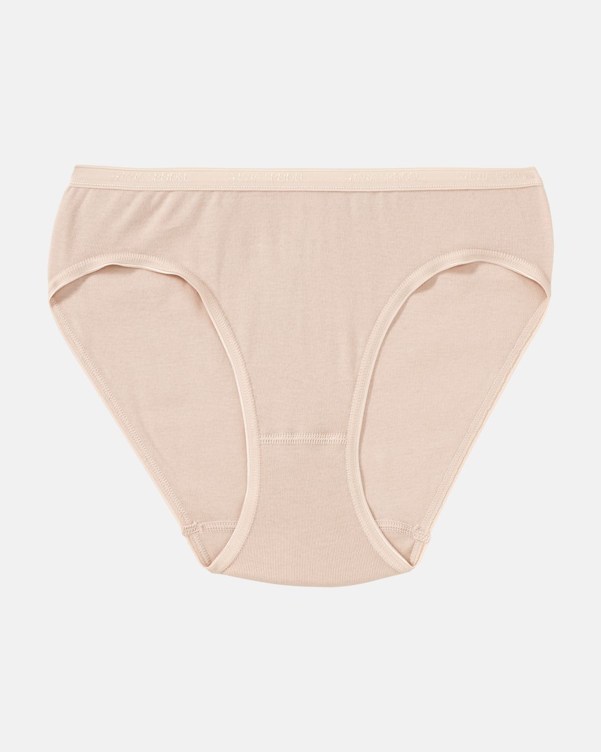 Minislip in honey aus der Serie Silke, flach auf einer Oberfläche liegend.