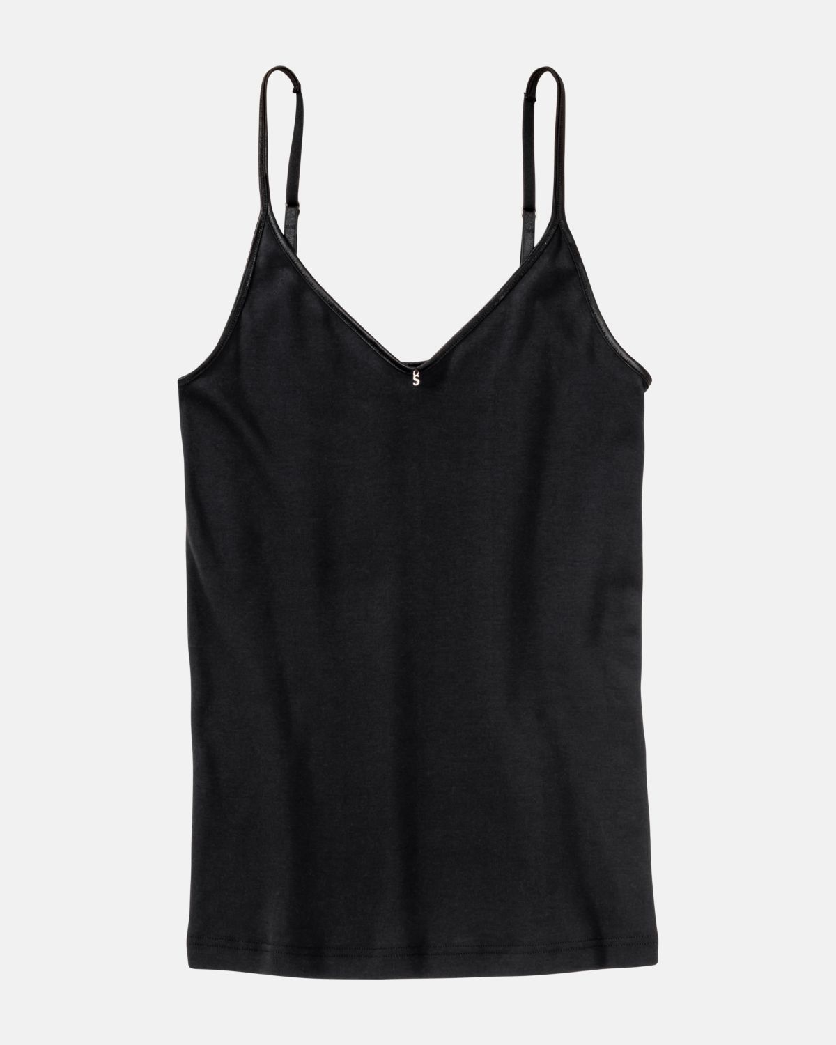 Hemd in schwarz aus der Serie Silke, flach auf einer Oberfläche liegend.