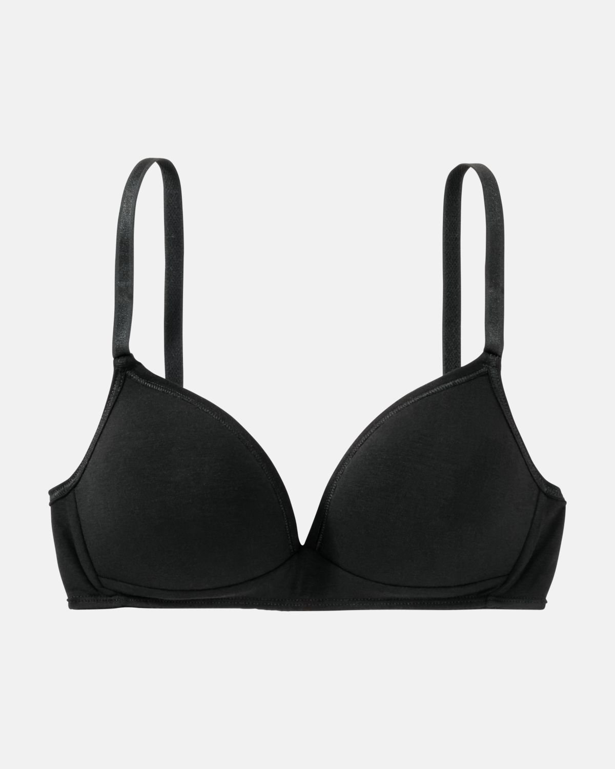 Schalen BH Triangle in schwarz aus der Serie Swenja, flach auf einer Oberfläche liegend.