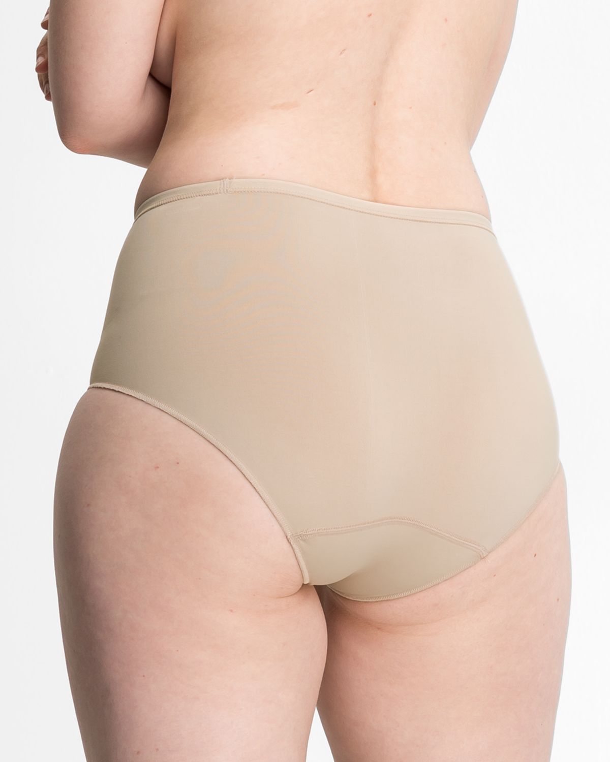 Model trägt Classic Slip in skin aus der Serie Inshape, Ansicht von hinten.