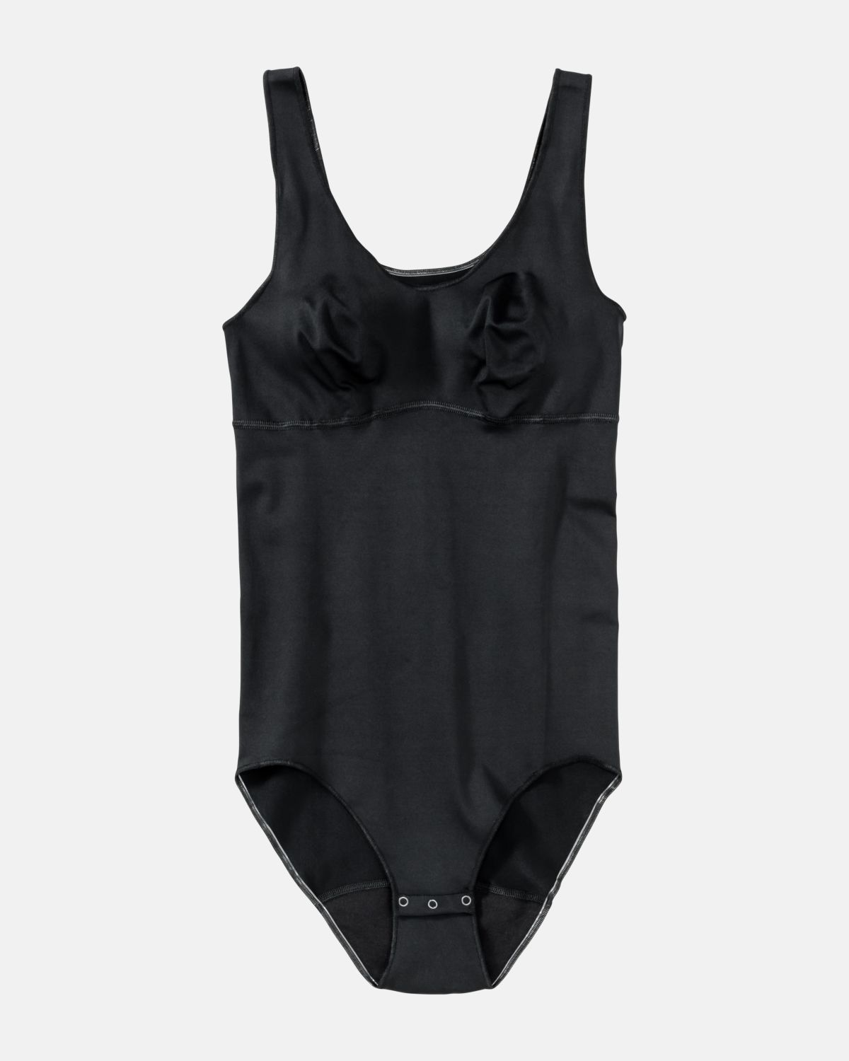 Body gemoldet in schwarz aus der Serie Inshape, flach auf einer Oberfläche liegend.