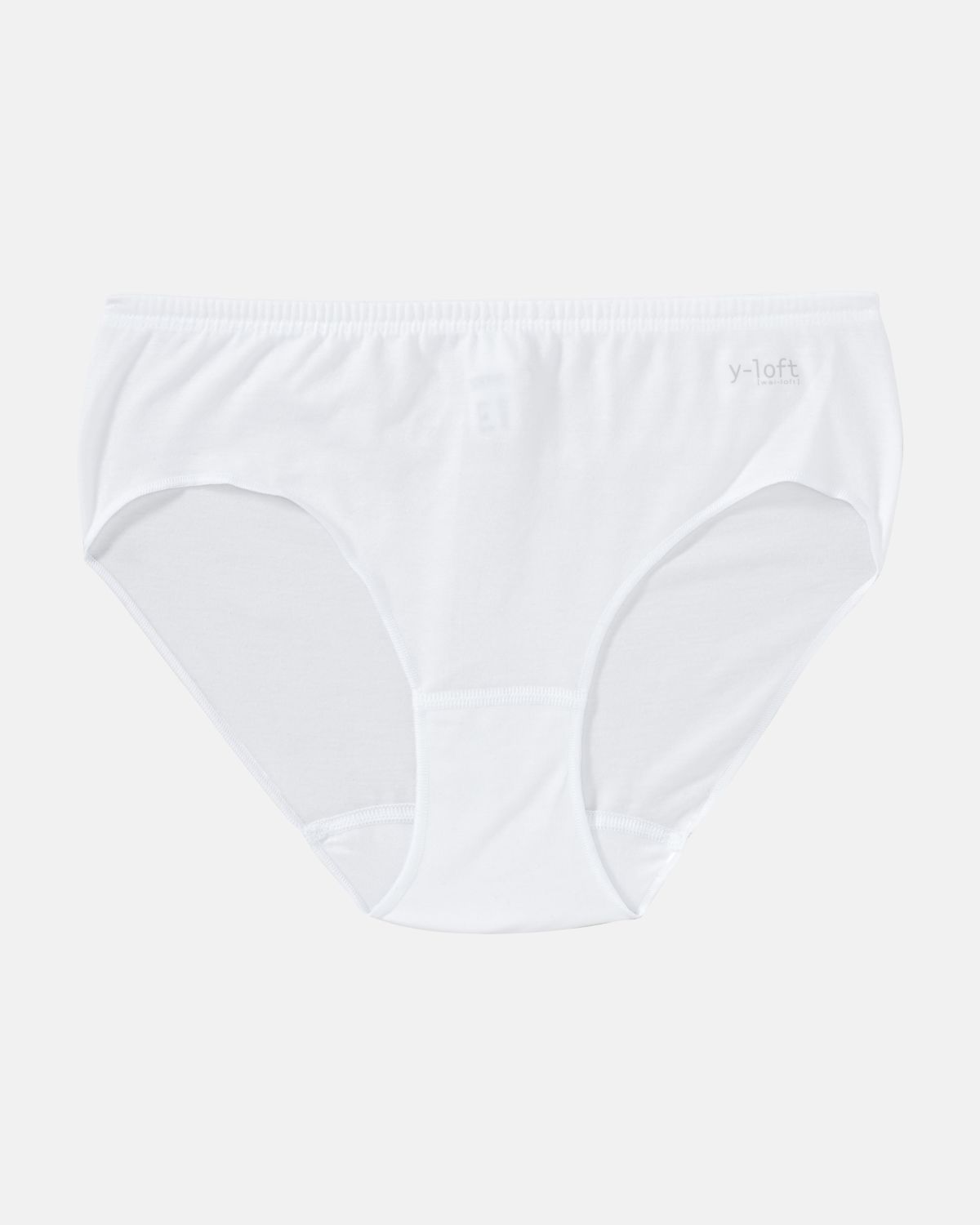 Midislip in weiß aus der Serie Y-loft, flach auf einer Oberfläche liegend.