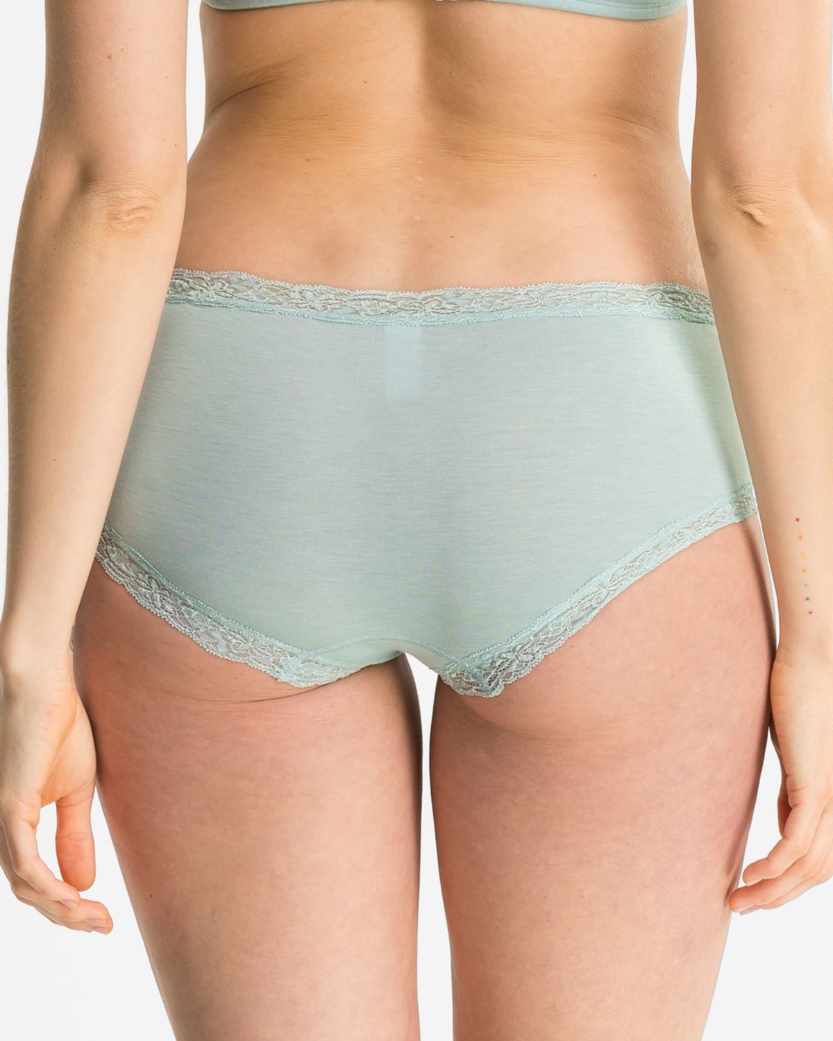 Model trägt Hipster in minze mélé aus der Serie Rahel, Ansicht von hinten.