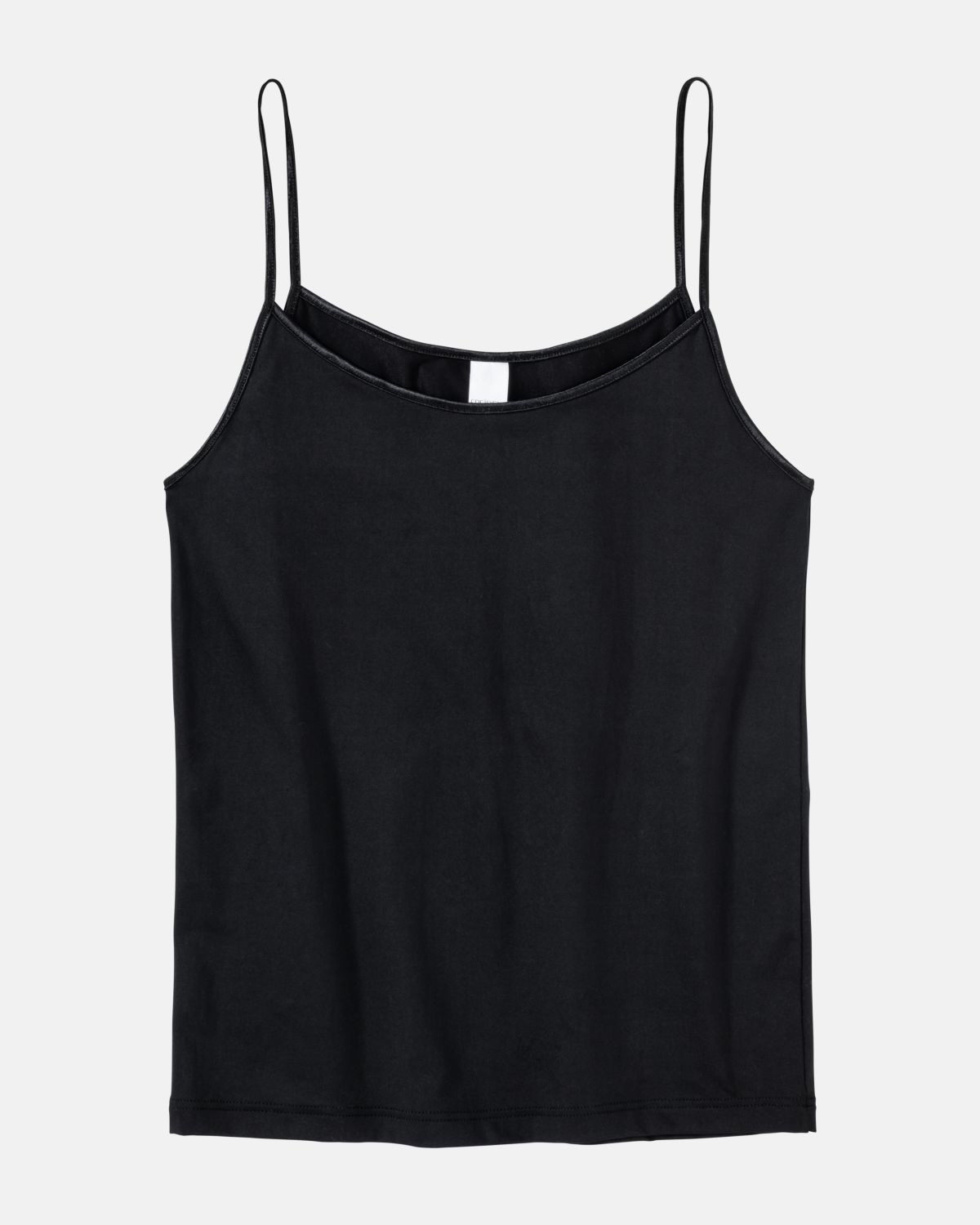 Hemd in schwarz aus der Serie Magic hip, flach auf einer Oberfläche liegend.