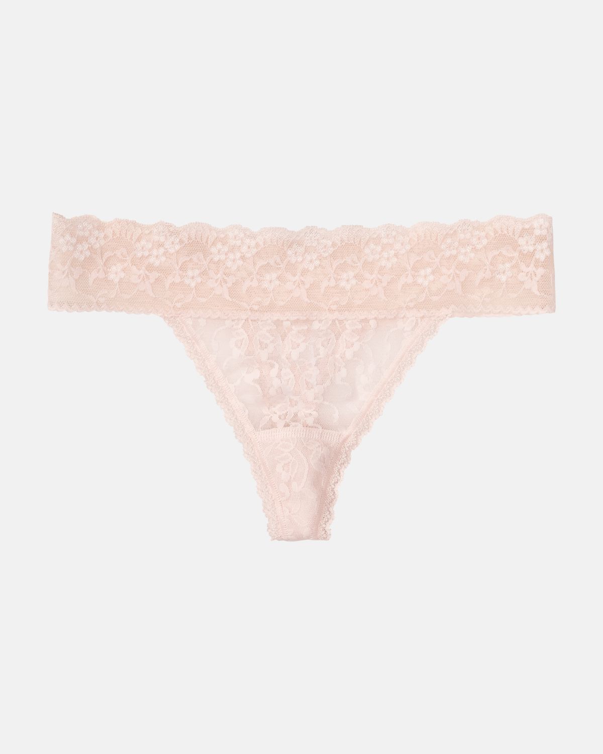 String, Triangleform in lychee aus der Serie Lacy, flach auf einer Oberfläche liegend.