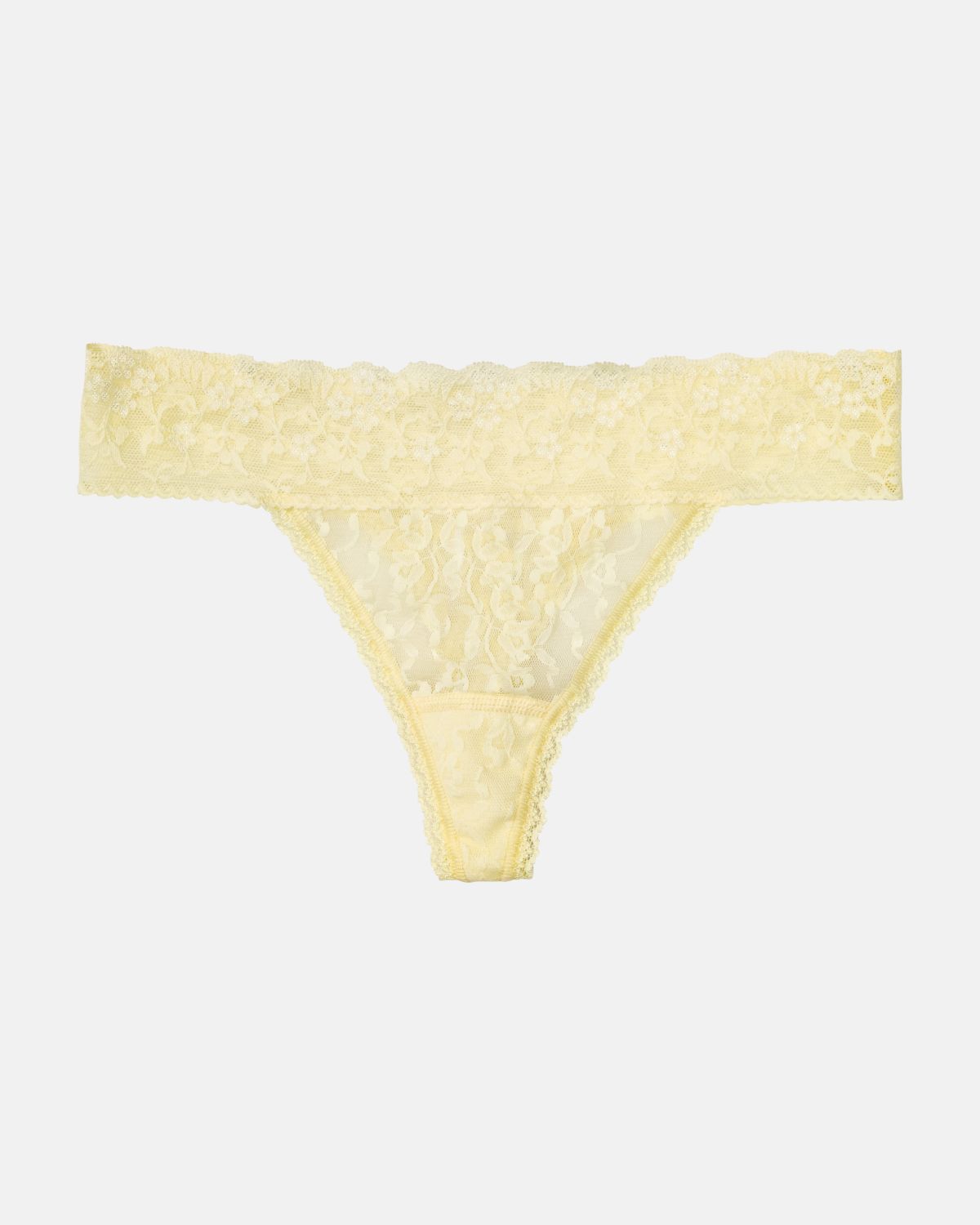 String, Triangleform in zitrone aus der Serie Lacy, flach auf einer Oberfläche liegend.