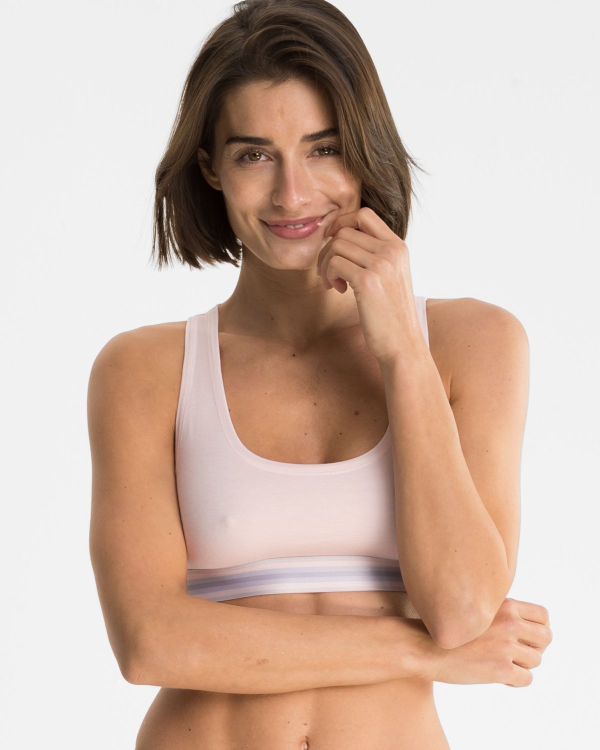 Model trägt Bustier in lychee mélé aus der Serie Ruby, Ansicht von vorne.