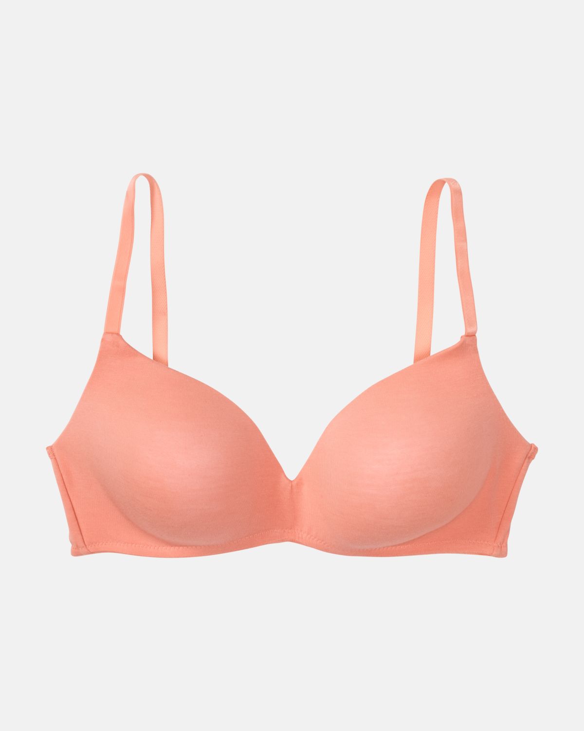 Schalen BH non wired in melone aus der Serie Softfeeling, flach auf einer Oberfläche liegend.