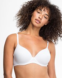 Model trägt Schalen BH mit Bügel in weiß aus der Serie Magic look, Ansicht von vorne.