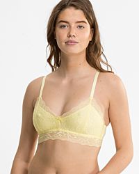 Model trägt Bralette in zitrone aus der Serie Lacy, Ansicht von vorne.