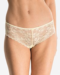 Model trägt Brazilstring in zitrone aus der Serie Romy, Ansicht von vorne.