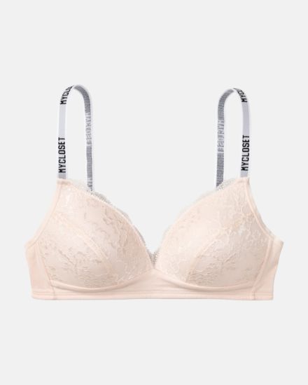 Schalen BH Triangle in lychee aus der Serie Logo Lover, flach auf einer Oberfläche liegend.