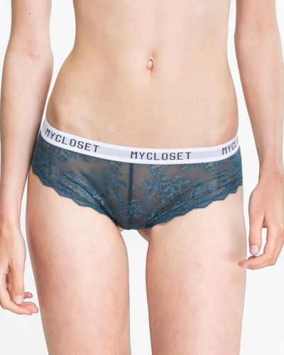 Model trägt Brazilstring in cord aus der Serie Logo Lover, Ansicht von vorne.