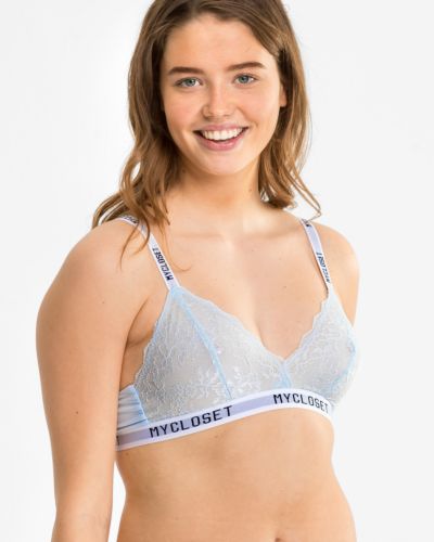 Model trägt Bralette in aquamarin aus der Serie Logo Lover, Ansicht von vorne.