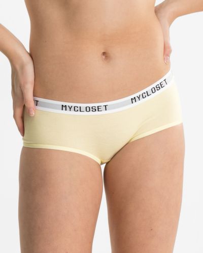 Model trägt Low Hip in zitrone aus der Serie Logo Lover, Ansicht von vorne.