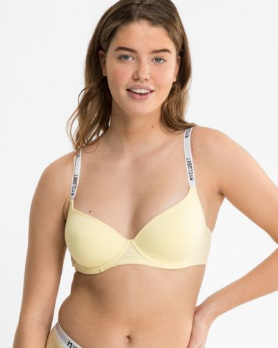 Model trägt T-Shirt BH mit Schalen in zitrone aus der Serie Logo Lover, Ansicht von vorne.