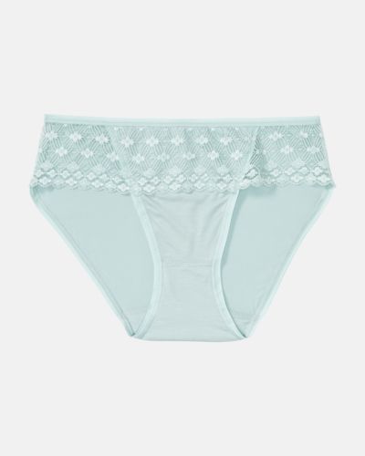 Bikinislip in minze aus der Serie Romina, flach auf einer Oberfläche liegend.