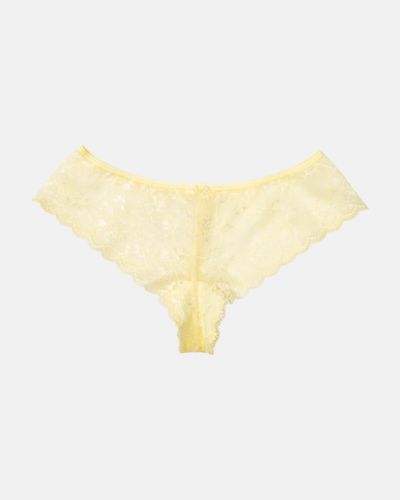 Brazilstring in zitrone aus der Serie Romy, flach auf einer Oberfläche liegend.