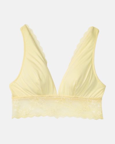 Bustier in zitrone aus der Serie Romy, flach auf einer Oberfläche liegend.