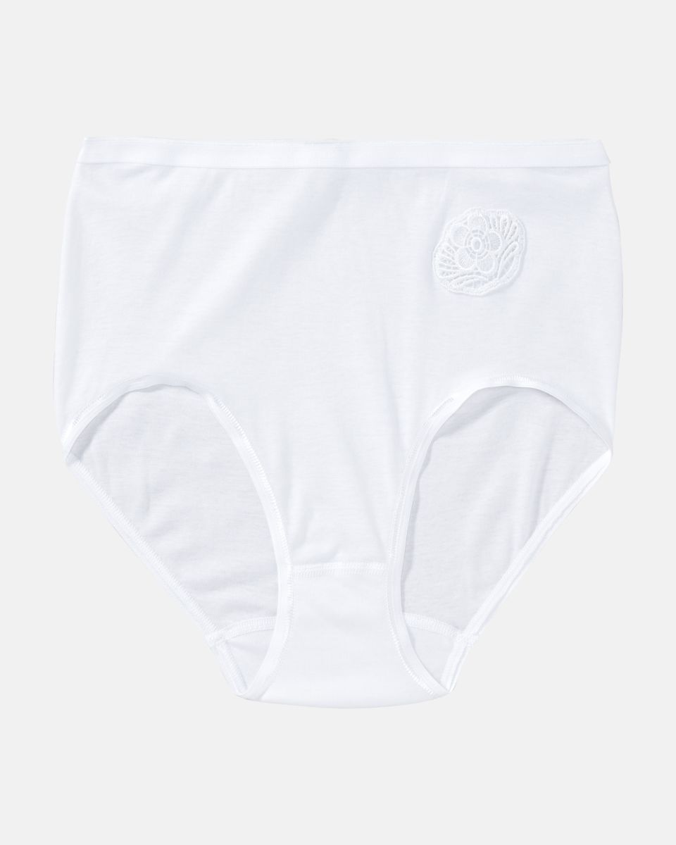 Taillenslip in weiß aus der Serie Nadja, flach auf einer Oberfläche liegend.