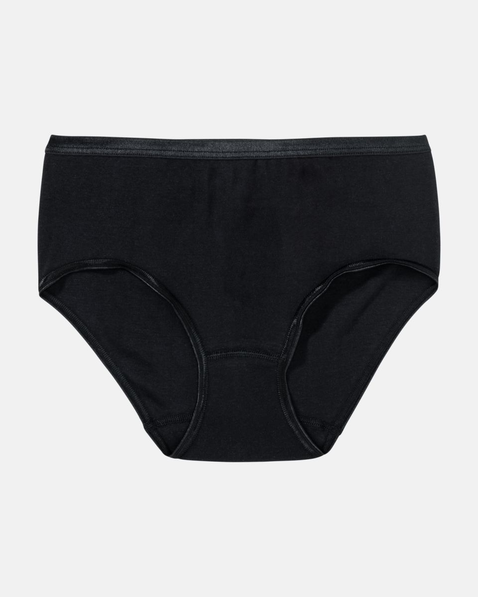 Midislip in schwarz aus der Serie Natascha, flach auf einer Oberfläche liegend.