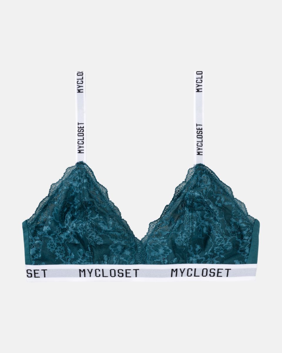 Bralette in cord aus der Serie Logo Lover, flach auf einer Oberfläche liegend.