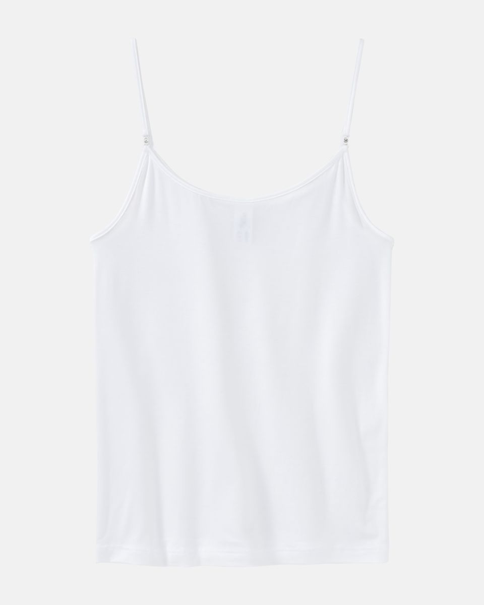 Hemd in weiß aus der Serie Sensuelle, flach auf einer Oberfläche liegend.