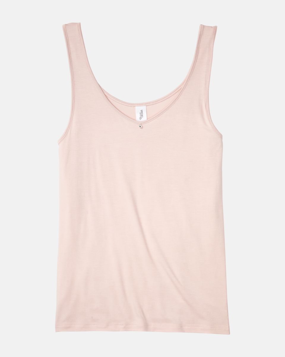 Achselhemd in lychee aus der Serie Sensuelle, flach auf einer Oberfläche liegend.