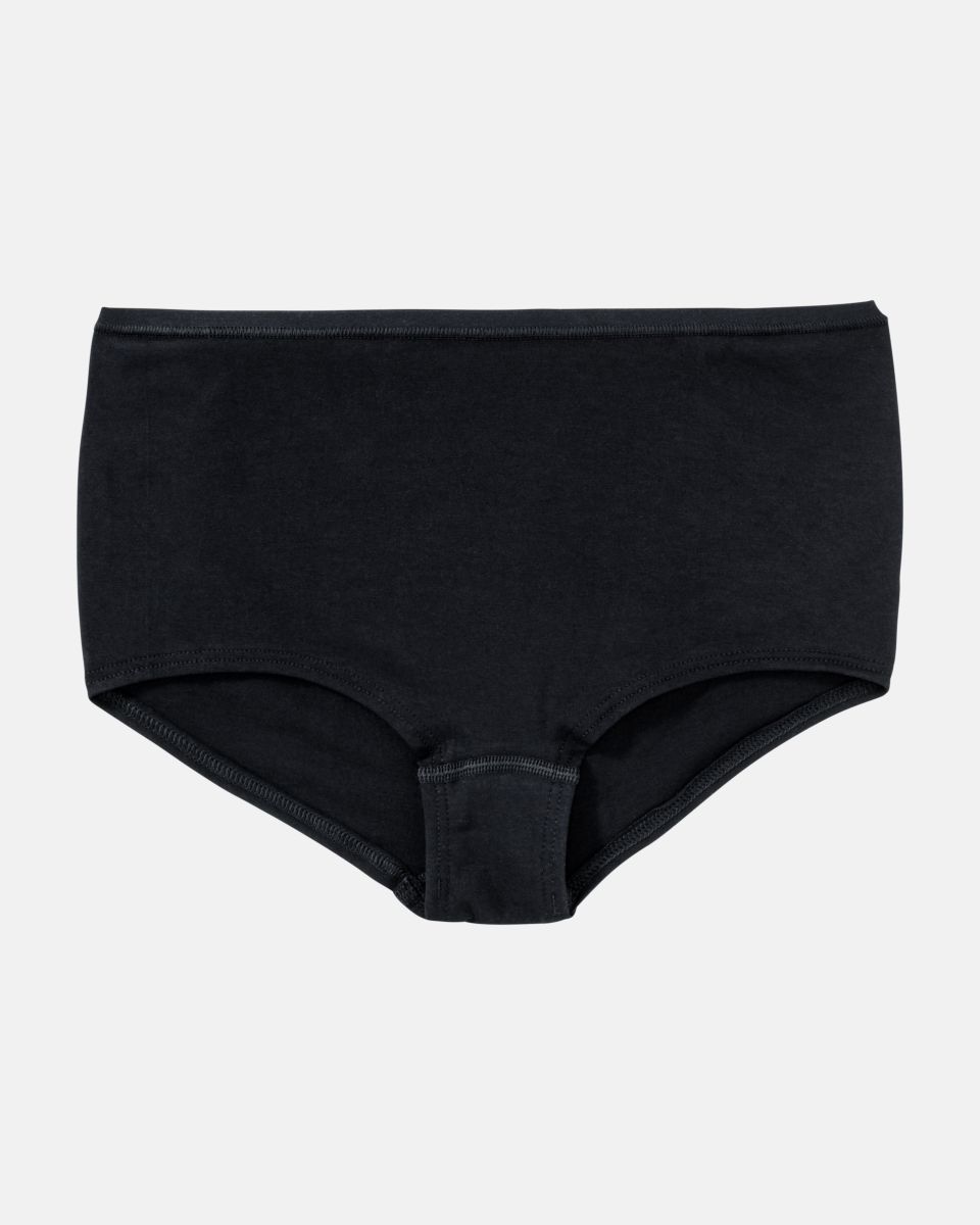 Pant in schwarz aus der Serie Natural Beauty, flach auf einer Oberfläche liegend.