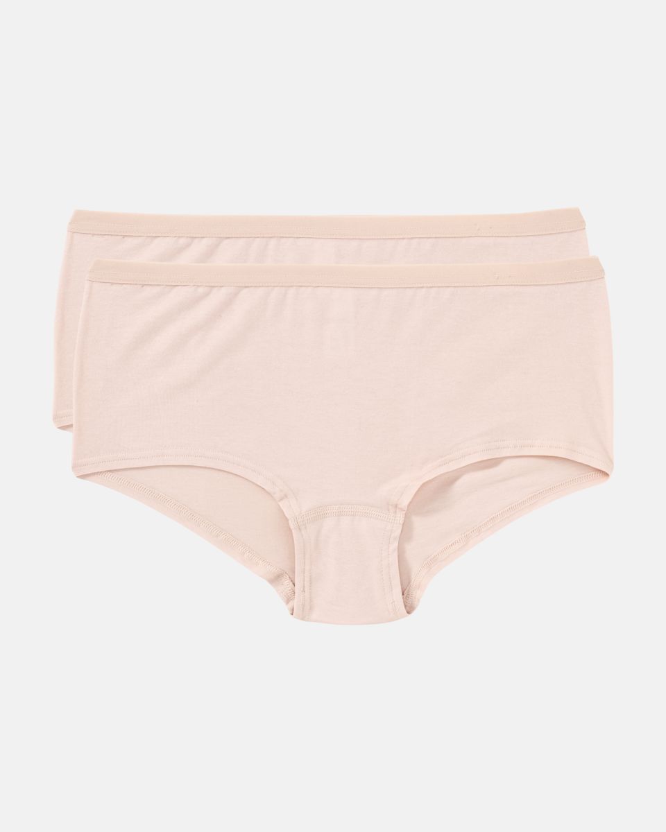 Pant in honey aus der Serie Take two, flach auf einer Oberfläche liegend.