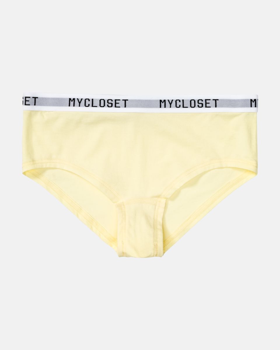 Pant in zitrone aus der Serie Logo Lover, flach auf einer Oberfläche liegend.