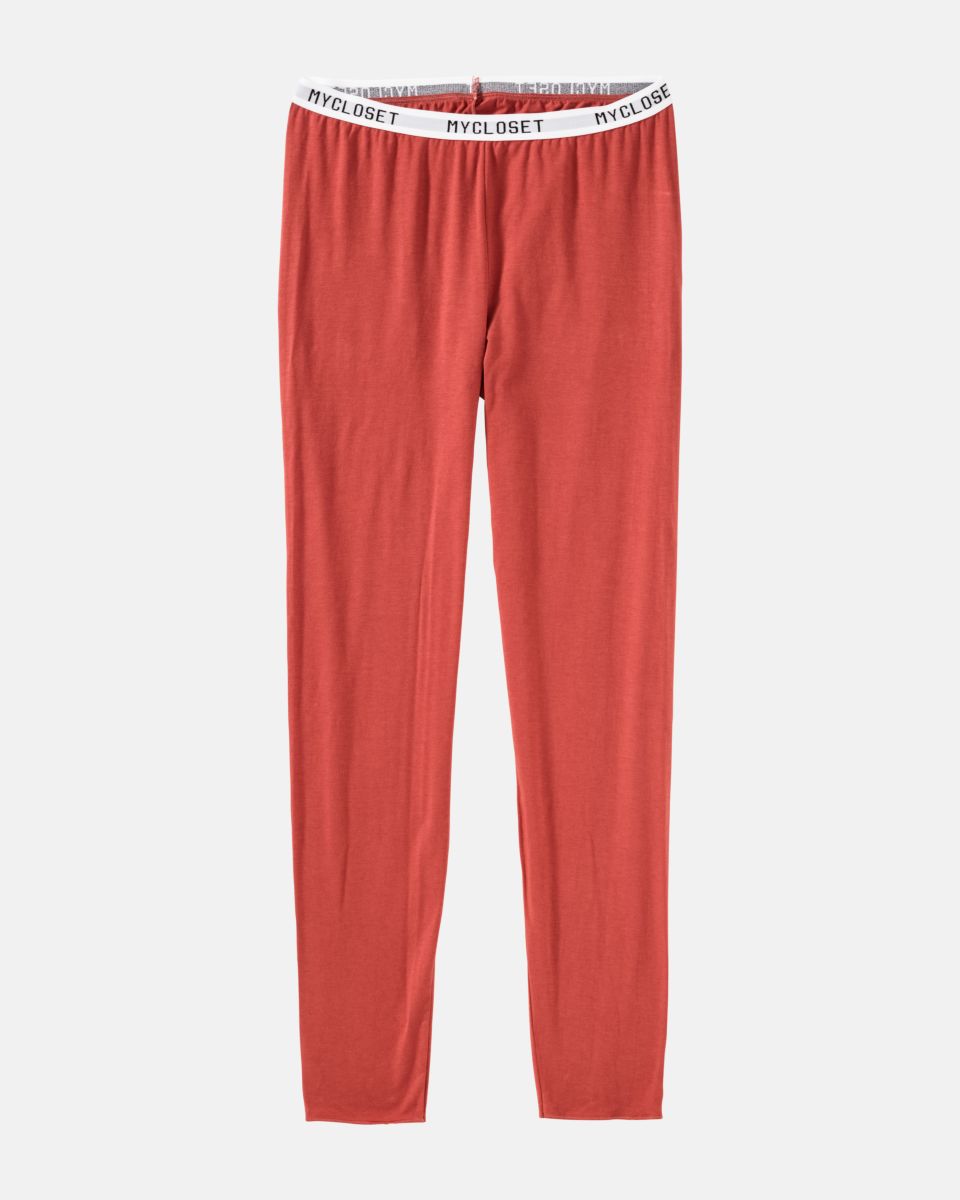 Leggings in pepper aus der Serie Logo Lover, flach auf einer Oberfläche liegend.