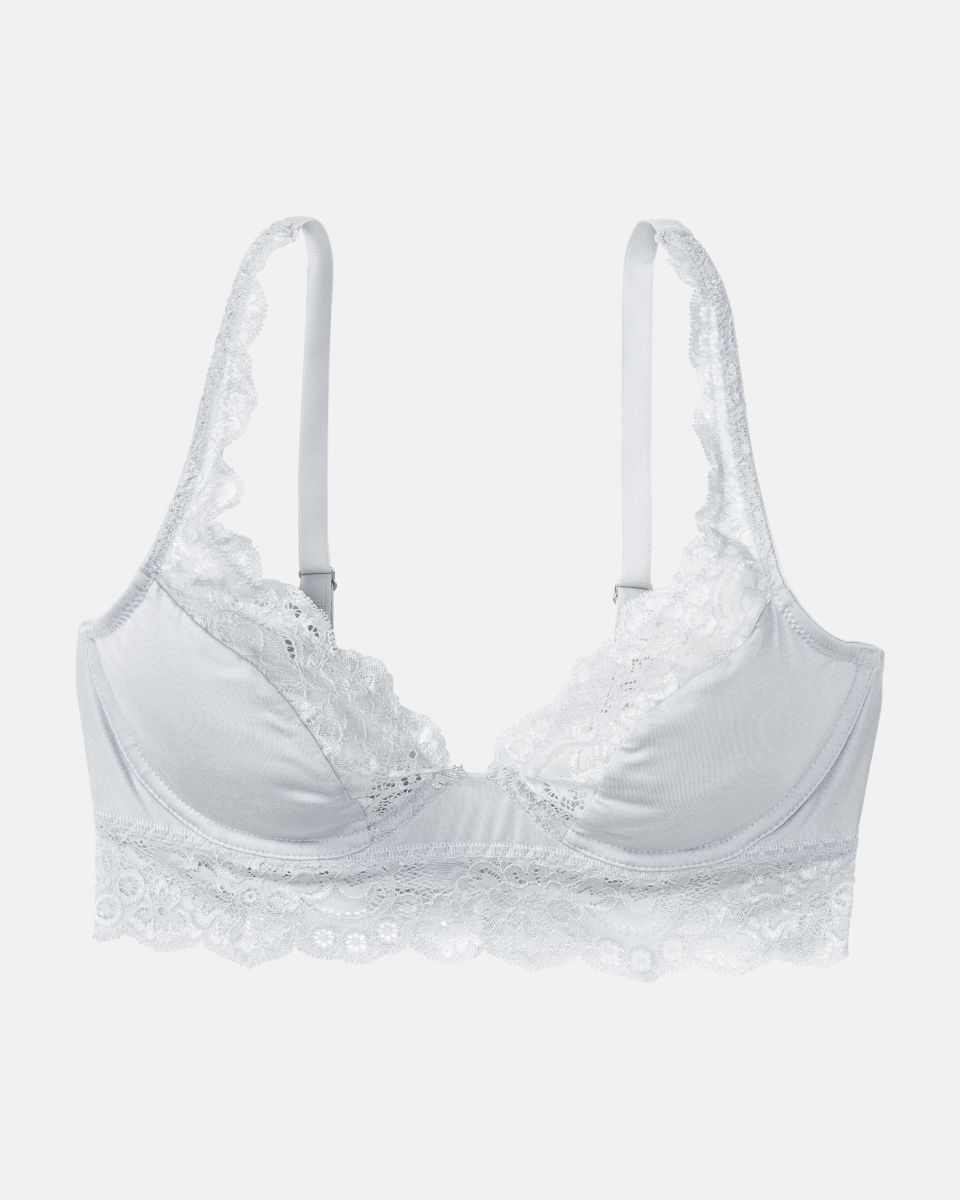 Bügel BH Longline in silbergrau aus der Serie Sensuelle Lace, flach auf einer Oberfläche liegend.