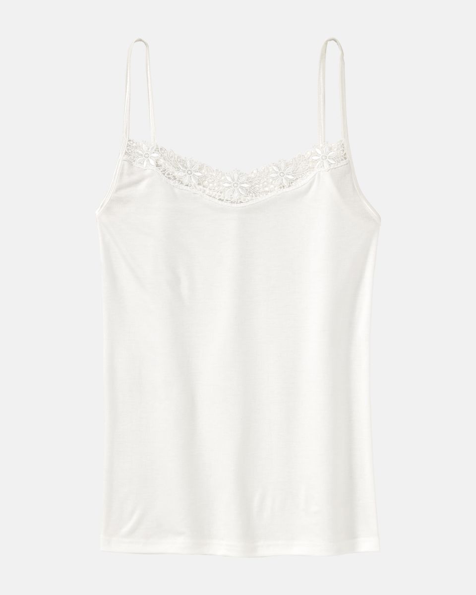 Hemd in elfenbein aus der Serie Sofia, flach auf einer Oberfläche liegend.