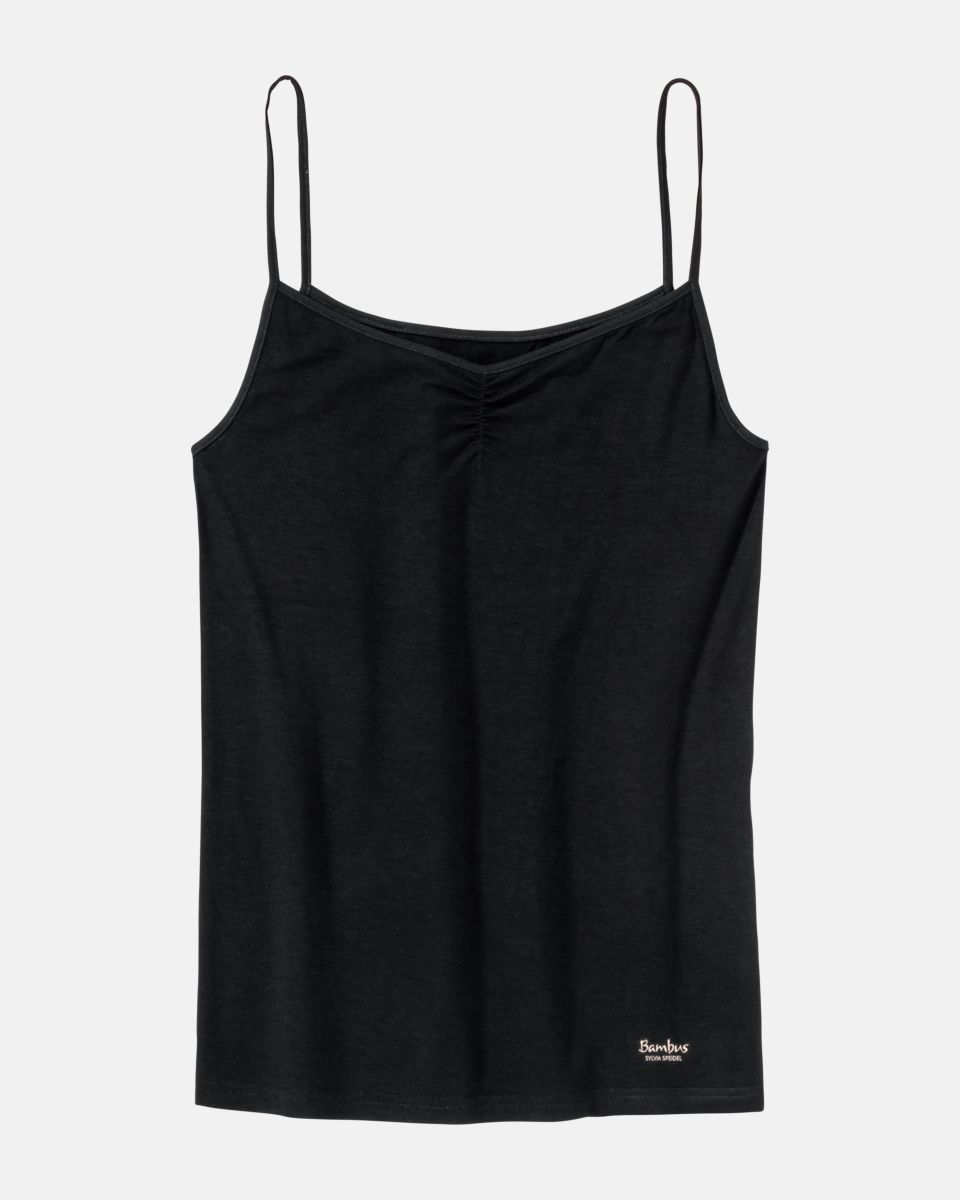 Hemd in schwarz aus der Serie Swenja, flach auf einer Oberfläche liegend.