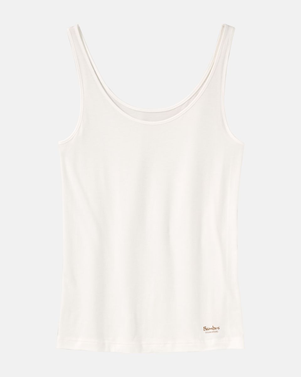 Achselhemd in elfenbein aus der Serie Swenja, flach auf einer Oberfläche liegend.