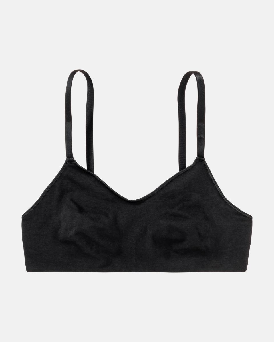 Soft BH gemoldet in schwarz aus der Serie Sally, flach auf einer Oberfläche liegend.