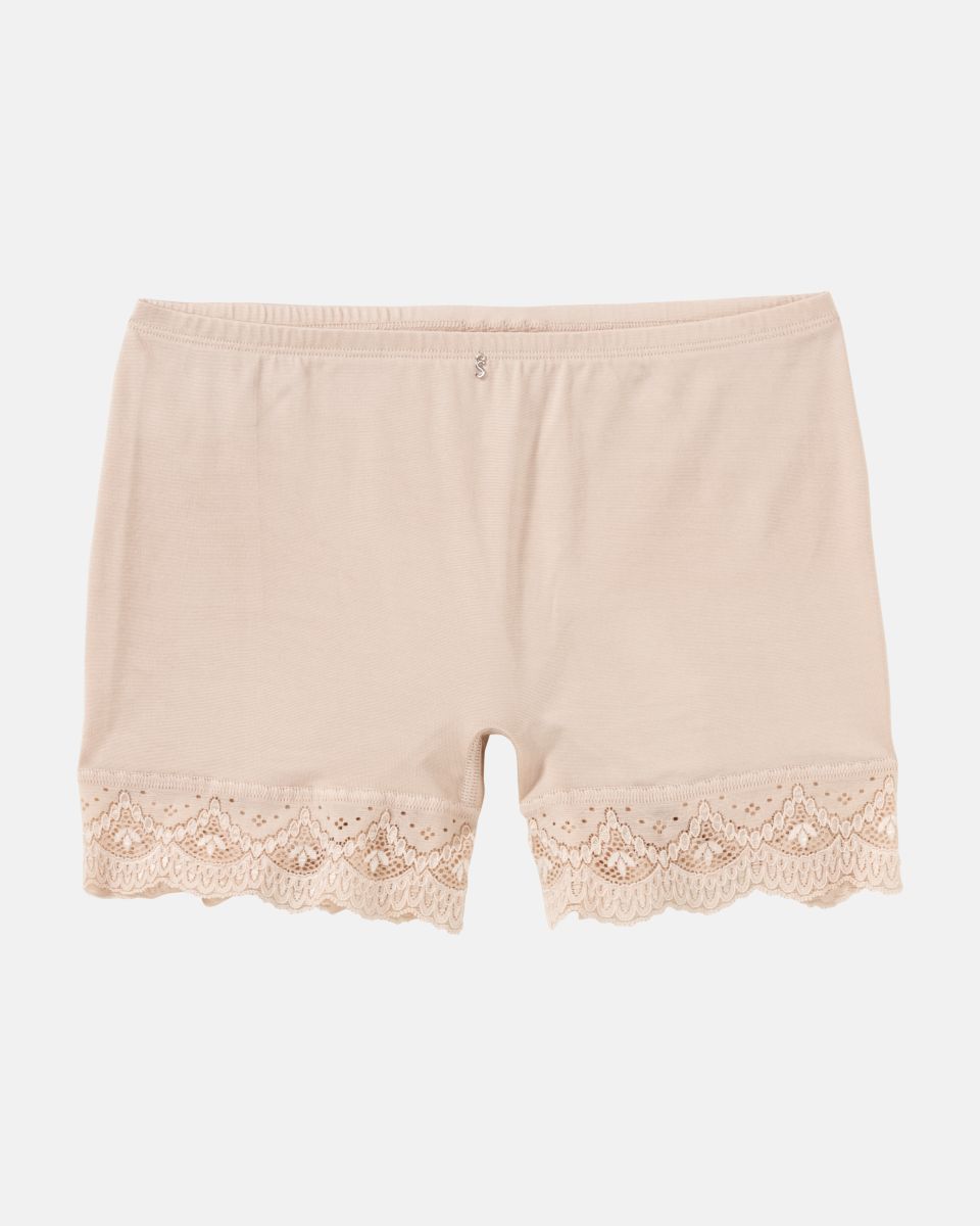 Pant in honey aus der Serie Stella, flach auf einer Oberfläche liegend.