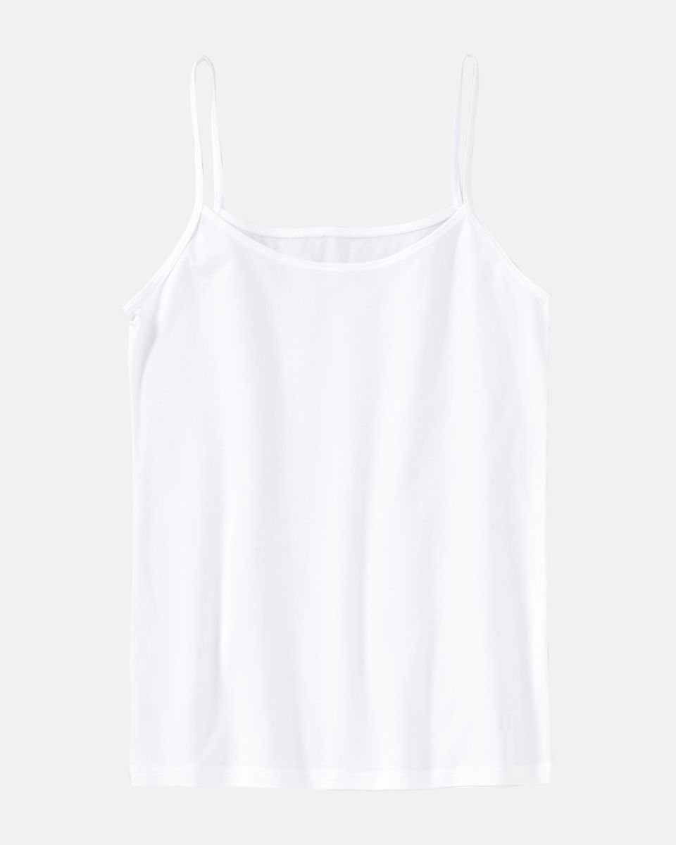 Hemd in weiß aus der Serie Sally, flach auf einer Oberfläche liegend.